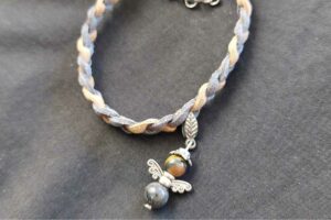 Engel armband met tijgeroog en lavasteen